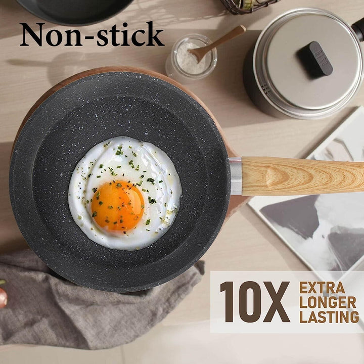 "12-piece granite coated nonstick cookware set with glass lids and ergonomic handles, perfect for versatile kitchen cooking."