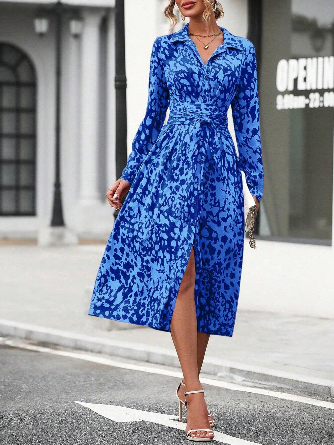 "A-Line Midi Dress with waist tie, button-down front, and classic fit, perfect for elegant and comfortable styling."
