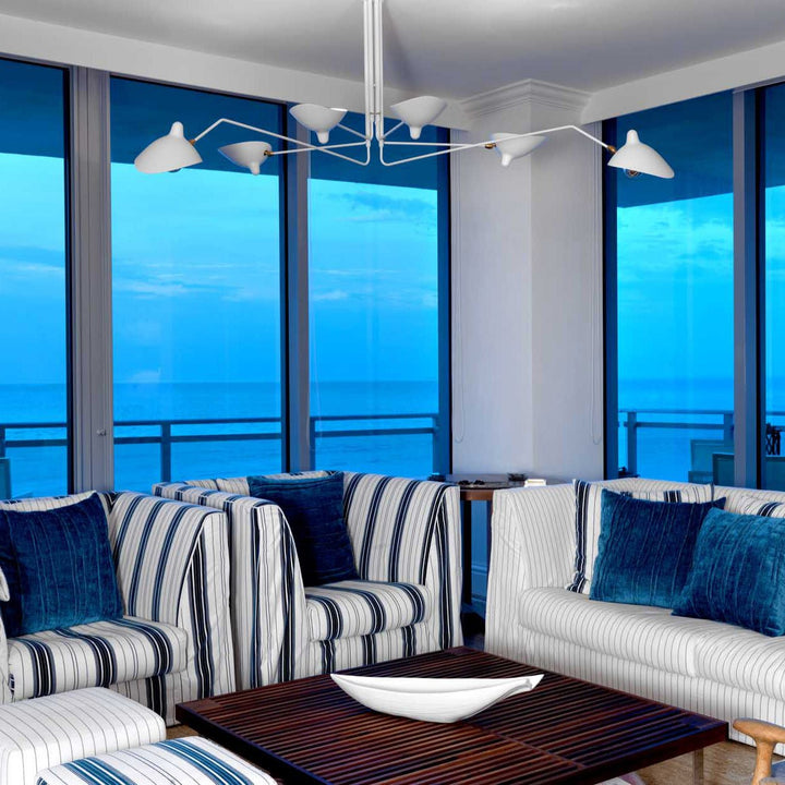 "Adjustable ceiling light with multiple arms, minimalist design, ideal for modern interiors, made of steel and aluminium."