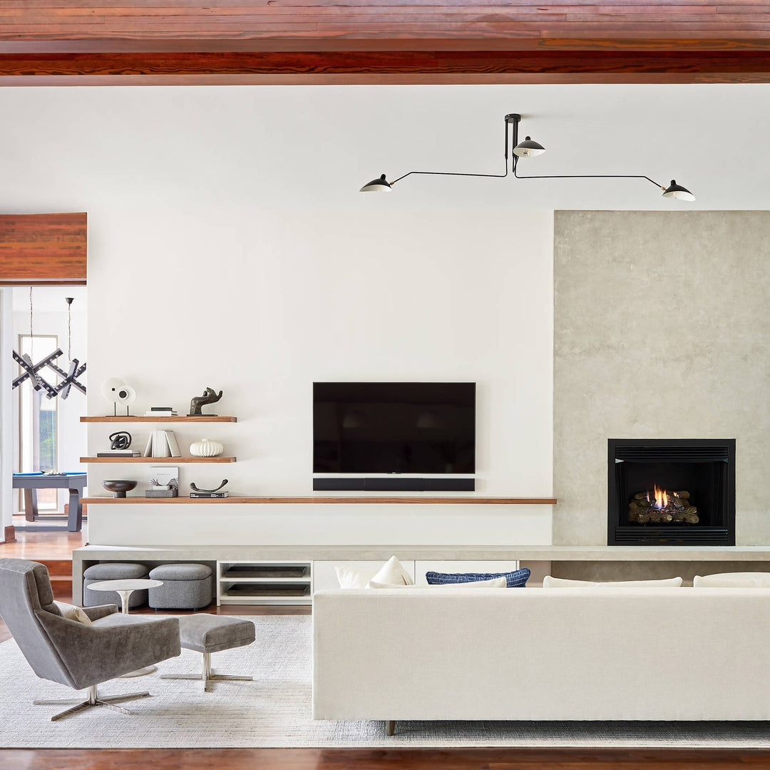 "Adjustable ceiling light with multiple arms, minimalist design, ideal for modern interiors, made of steel and aluminium."