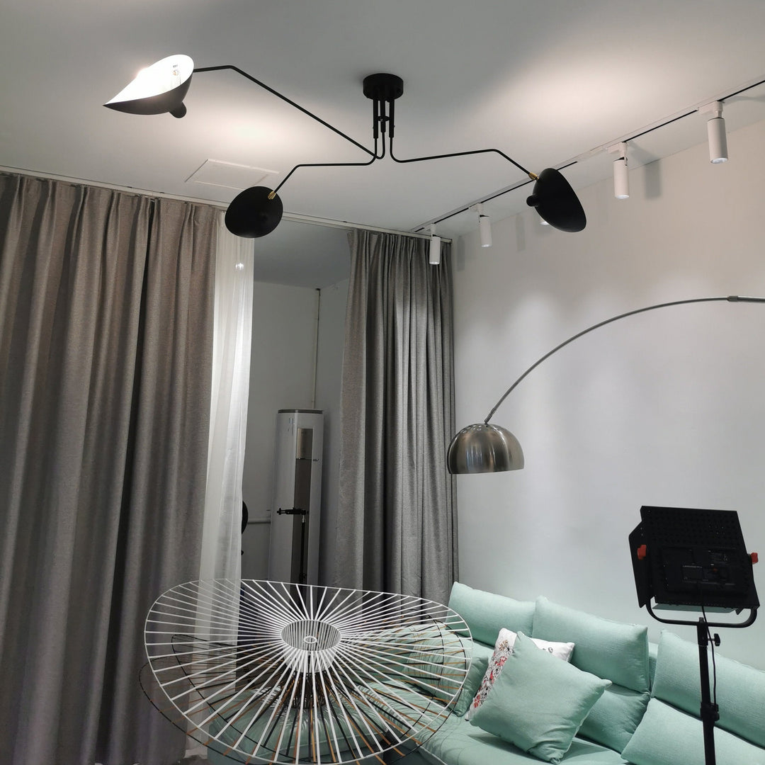 "Adjustable ceiling light with multiple arms, minimalist design, ideal for modern interiors, made of steel and aluminium."