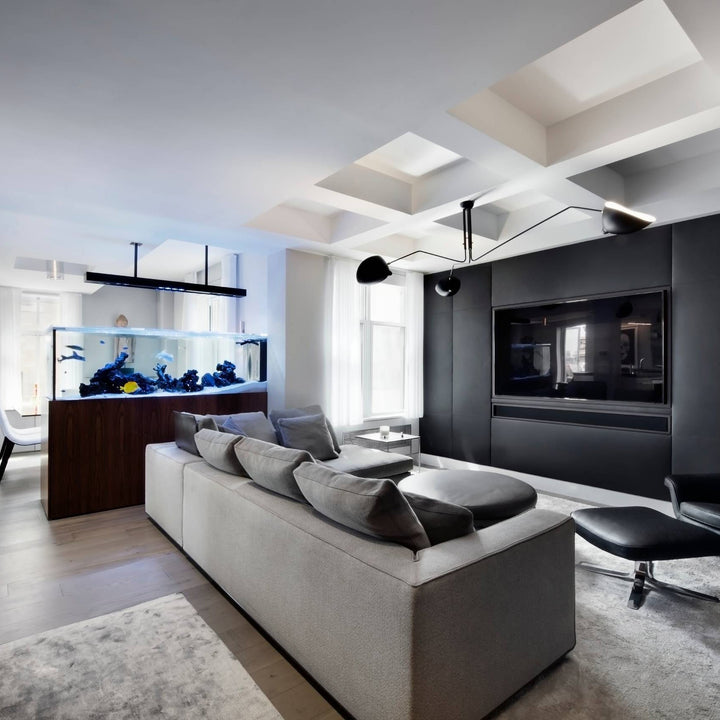 "Adjustable ceiling light with multiple arms, minimalist design, ideal for modern interiors, made of steel and aluminium."