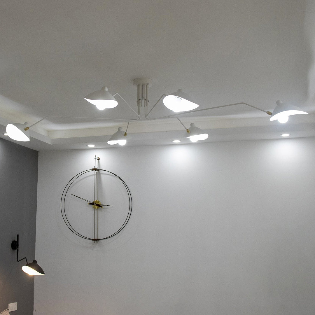 "Adjustable ceiling light with multiple arms, minimalist design, ideal for modern interiors, made of steel and aluminium."