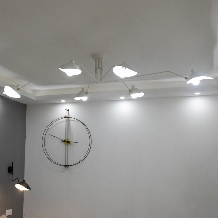 "Adjustable ceiling light with multiple arms, minimalist design, ideal for modern interiors, made of steel and aluminium."
