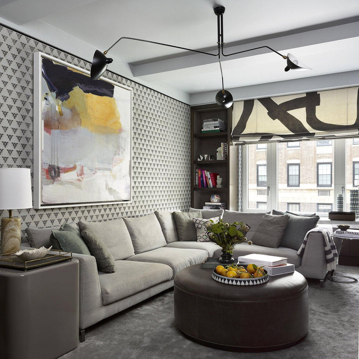 "Adjustable ceiling light with multiple arms, minimalist design, ideal for modern interiors, made of steel and aluminium."