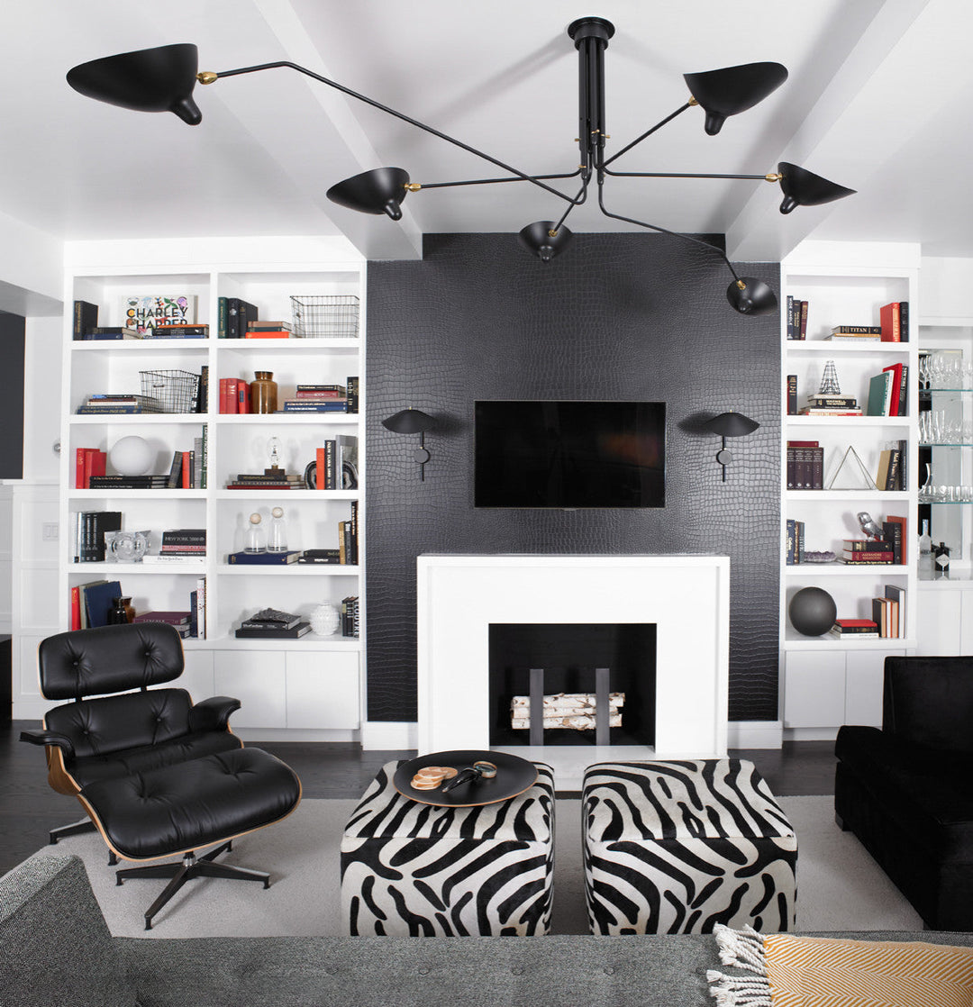 "Adjustable ceiling light with multiple arms, minimalist design, ideal for modern interiors, made of steel and aluminium."