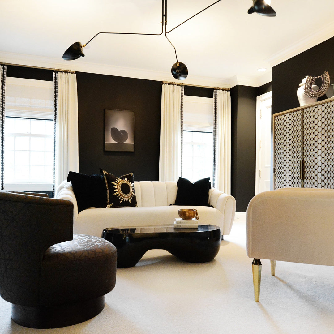 "Adjustable ceiling light with multiple arms, minimalist design, ideal for modern interiors, made of steel and aluminium."