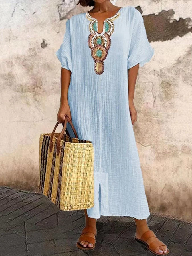Airy cotton kaftan dress with ethnic accents, featuring a loose fit and chic bohemian style for summer wear.