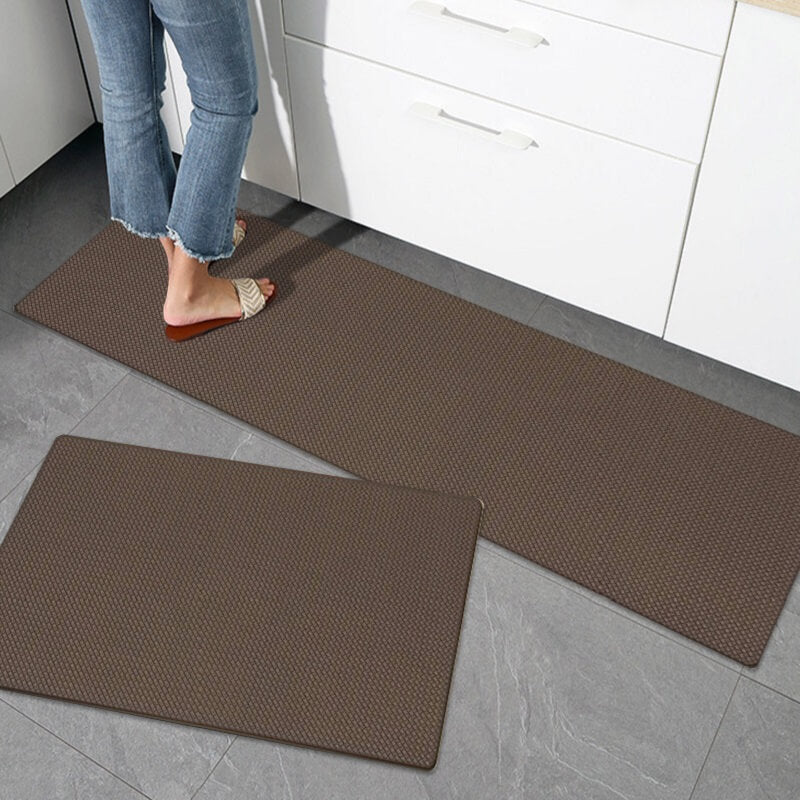 "Anti-slip waterproof kitchen rug with comfort cushioning, durable PVC, two-sided no-slip design, in grey rhombus pattern."