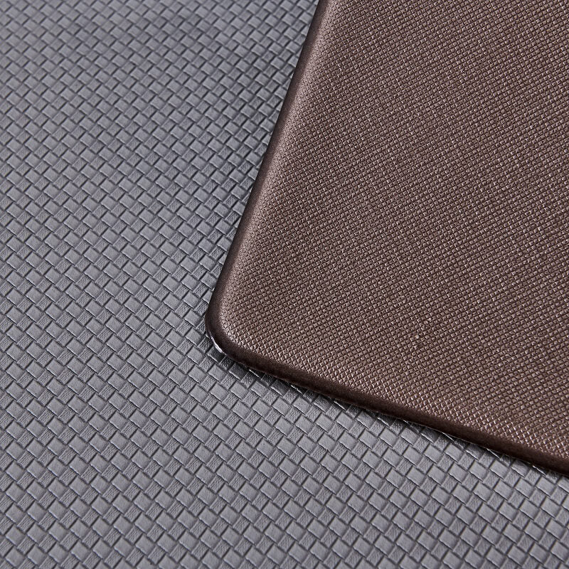 "Anti-slip waterproof kitchen rug with comfort cushioning, durable PVC, two-sided no-slip design, in grey rhombus pattern."