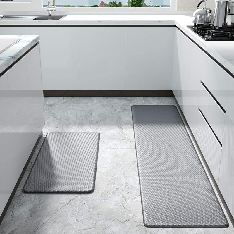 "Anti-slip waterproof kitchen rug with comfort cushioning, durable PVC, two-sided no-slip design, in grey rhombus pattern."