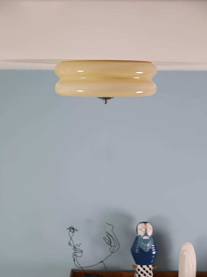"Art Deco ceiling light with integrated LED, featuring geometric design in iron, metal, and glass for vintage elegance."