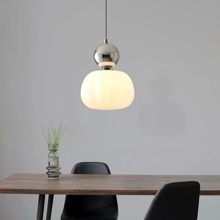 "Art Deco Cream Pendant Light with Bauhaus design, features high-quality metal frame and warm glow for elegant home lighting.