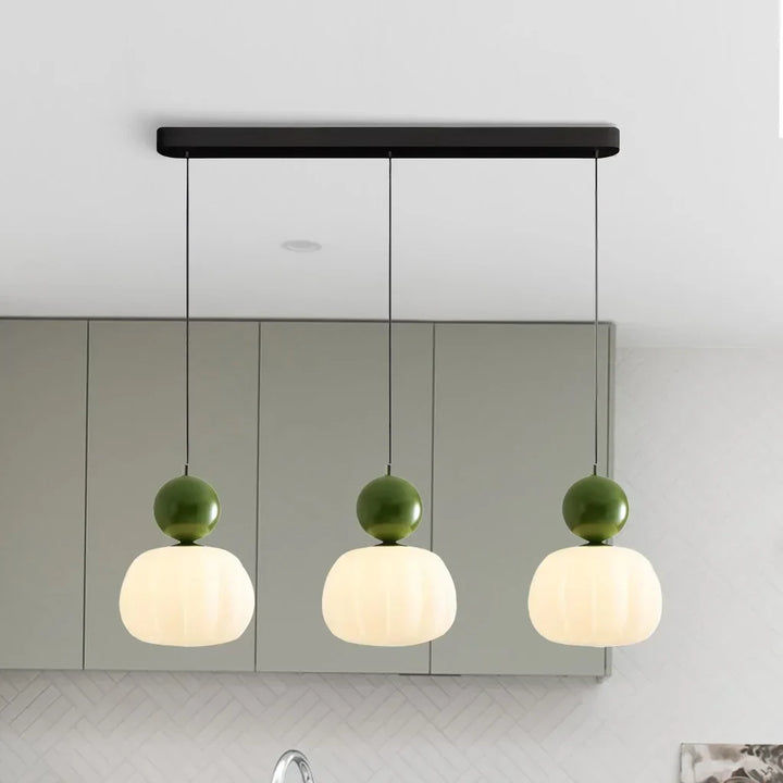 "Art Deco Cream Pendant Light with Bauhaus design, features high-quality metal frame and warm glow for elegant home lighting.