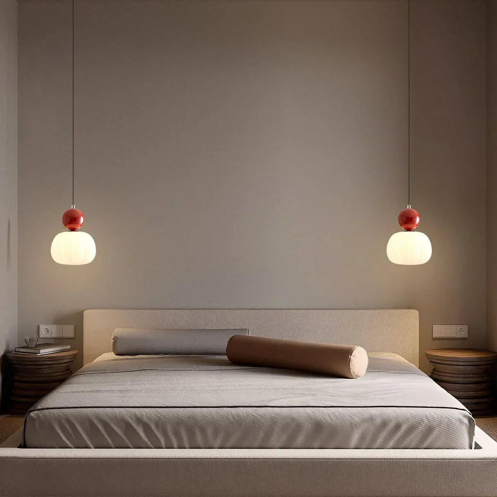 "Art Deco Cream Pendant Light with Bauhaus design, features high-quality metal frame and warm glow for elegant home lighting.