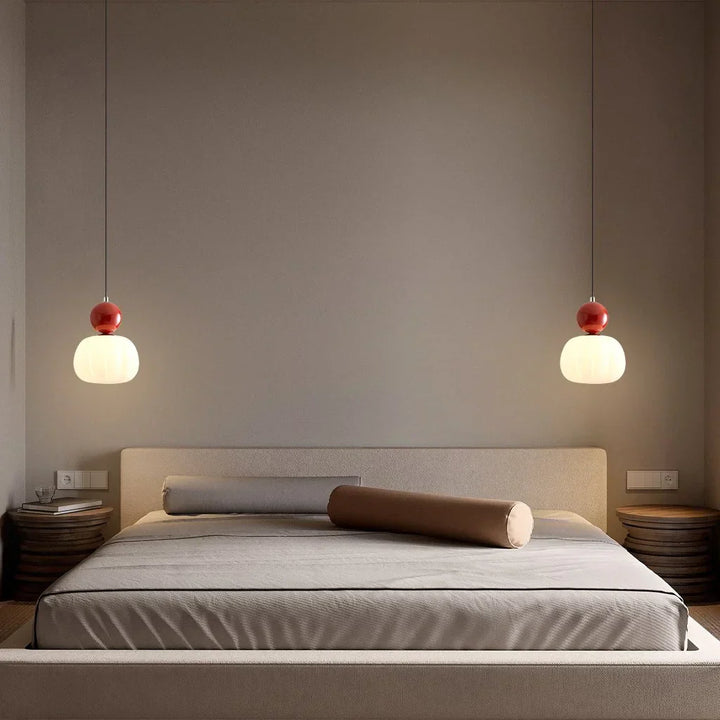 "Art Deco Cream Pendant Light with Bauhaus design, features high-quality metal frame and warm glow for elegant home lighting.
