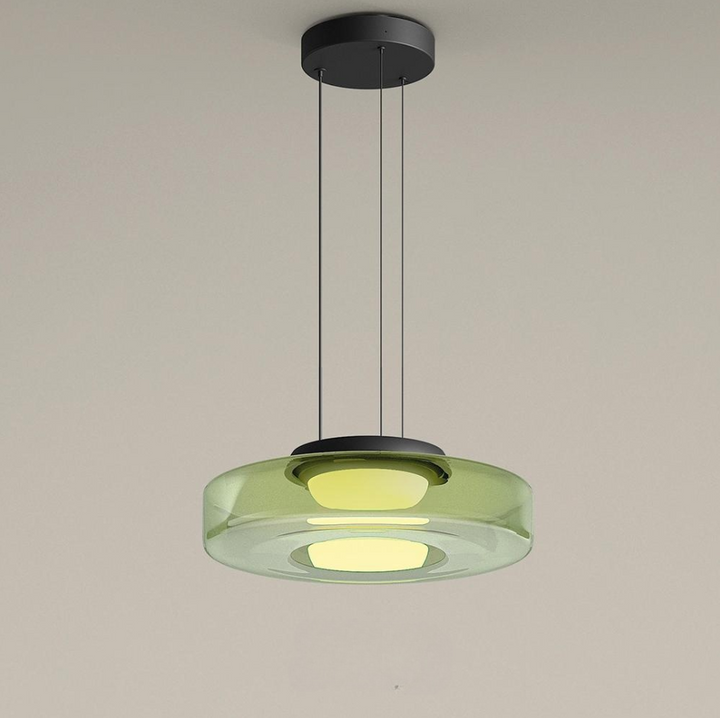 "Bauhaus style glass pendant light with sleek design enhances modern home decor, ideal for kitchens and living spaces."