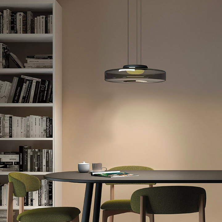 "Bauhaus style glass pendant light with sleek design enhances modern home decor, ideal for kitchens and living spaces."