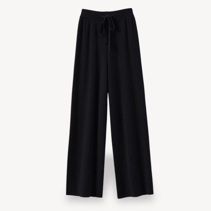 Beige cashmere wide-leg pants for women, offering comfort and style with a relaxed fit and drawstring adjustable waist.