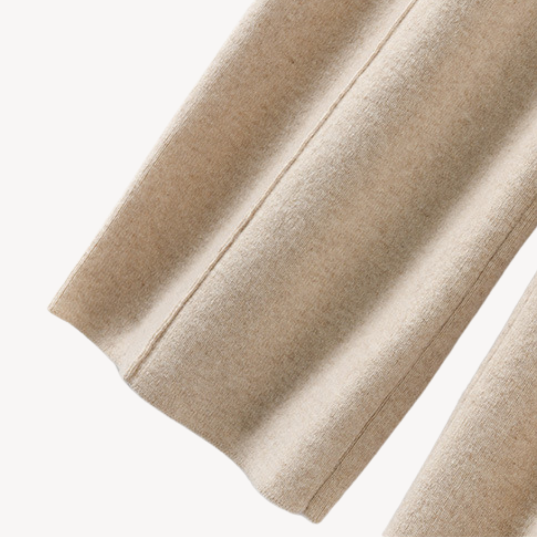 Beige cashmere wide-leg pants for women, offering comfort and style with a relaxed fit and drawstring adjustable waist.