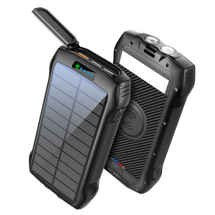 "Black and orange portable solar power bank for outdoor use, showcasing sleek design and multiple charging ports."