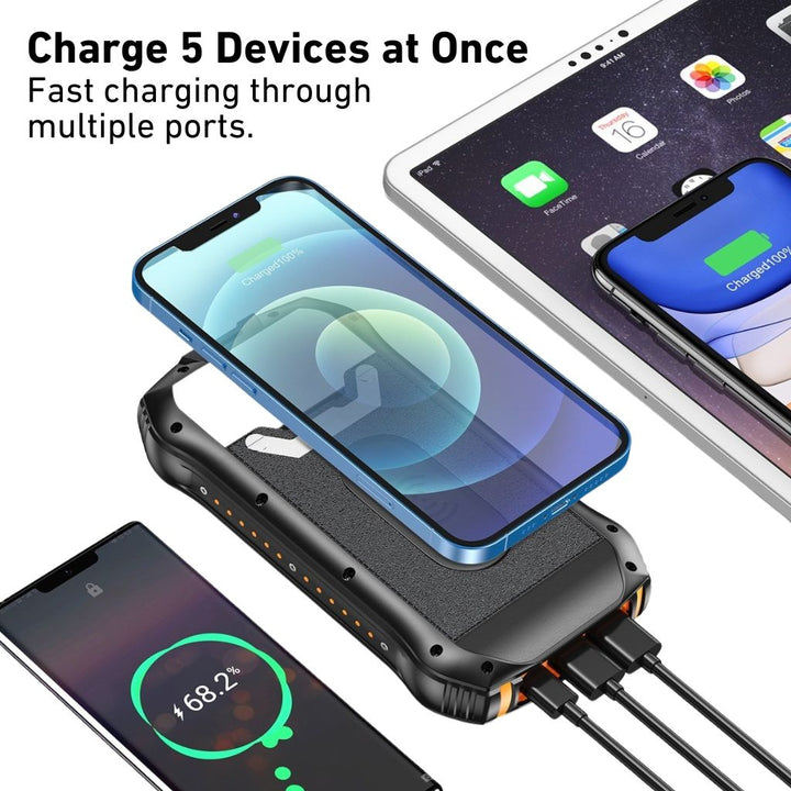 "Black and orange portable solar power bank for outdoor use, showcasing sleek design and multiple charging ports."