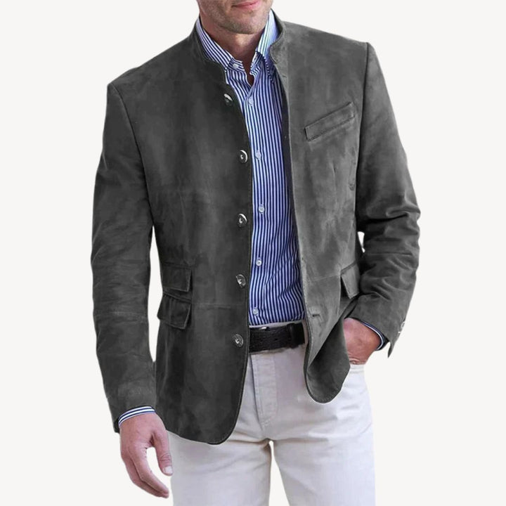 Black suede men's blazer jacket with stand collar, button-up front, and chic design, ideal for versatile styling.
