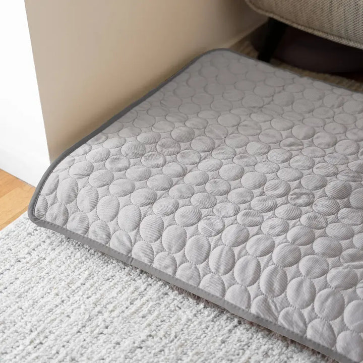 "Blue dog cooling mat, foldable and portable, offers instant cooling, waterproof, and safe for indoor and outdoor use."