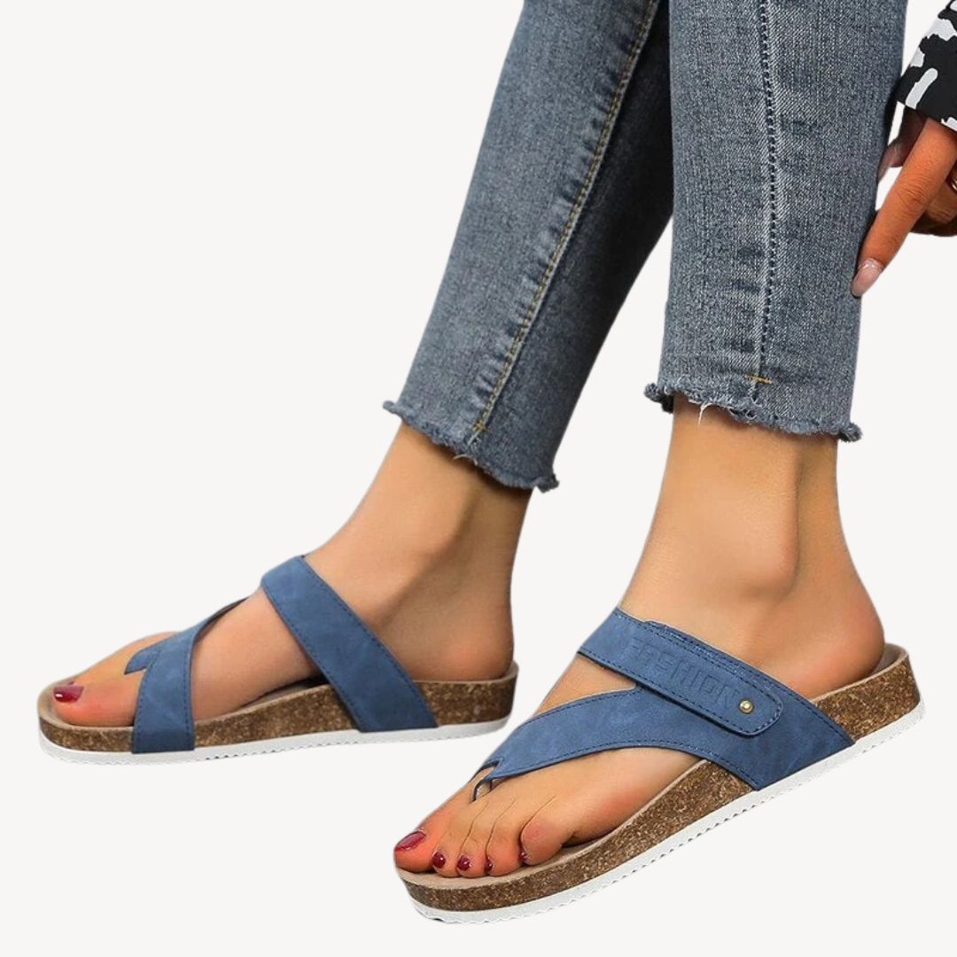 Blue orthopedic women's cork thong sandals with soft strap, showcasing comfort and support, perfect for casual summer wear.