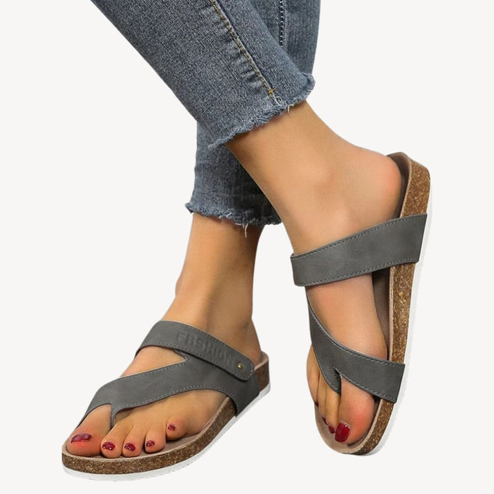 Blue orthopedic women's cork thong sandals with soft strap, showcasing comfort and support, perfect for casual summer wear.