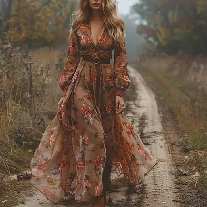 Boho long sleeve floral maxi dress with tiered skirt, featuring vibrant floral print; women's flowing fit for multiple occasi