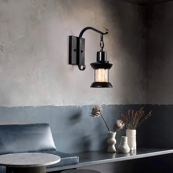 Bronze vintage industrial wall sconce lamp with oil-bronze finish and glass shade, perfect for living room lighting.