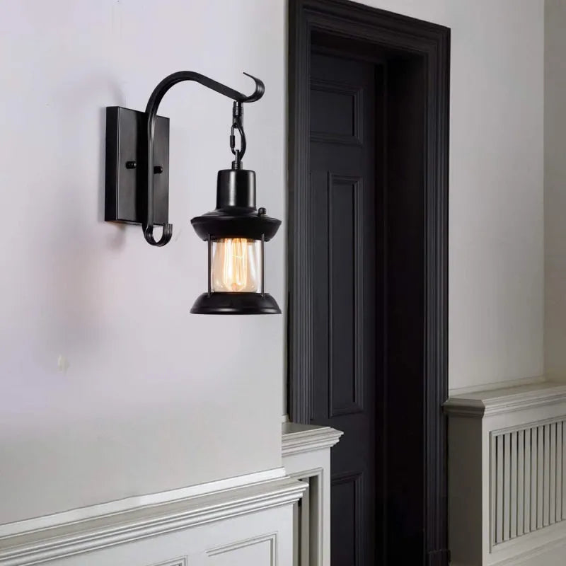 Bronze vintage industrial wall sconce lamp with oil-bronze finish and glass shade, perfect for living room lighting.
