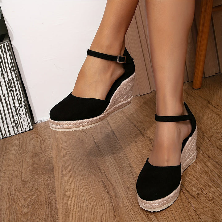 Brown women's wedge espadrille sandals with chic design and durable construction, perfect for summer fashion.