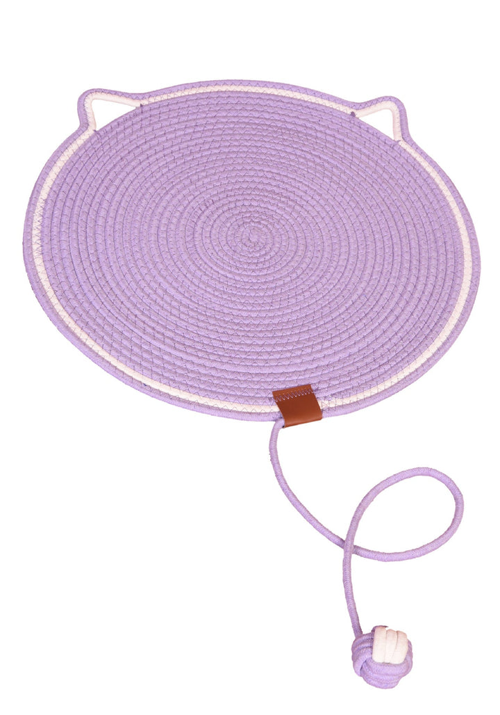 "Cat lounging on stylish, durable cat scratching rug; elegant, textured mat for optimal claw care and furniture protection."