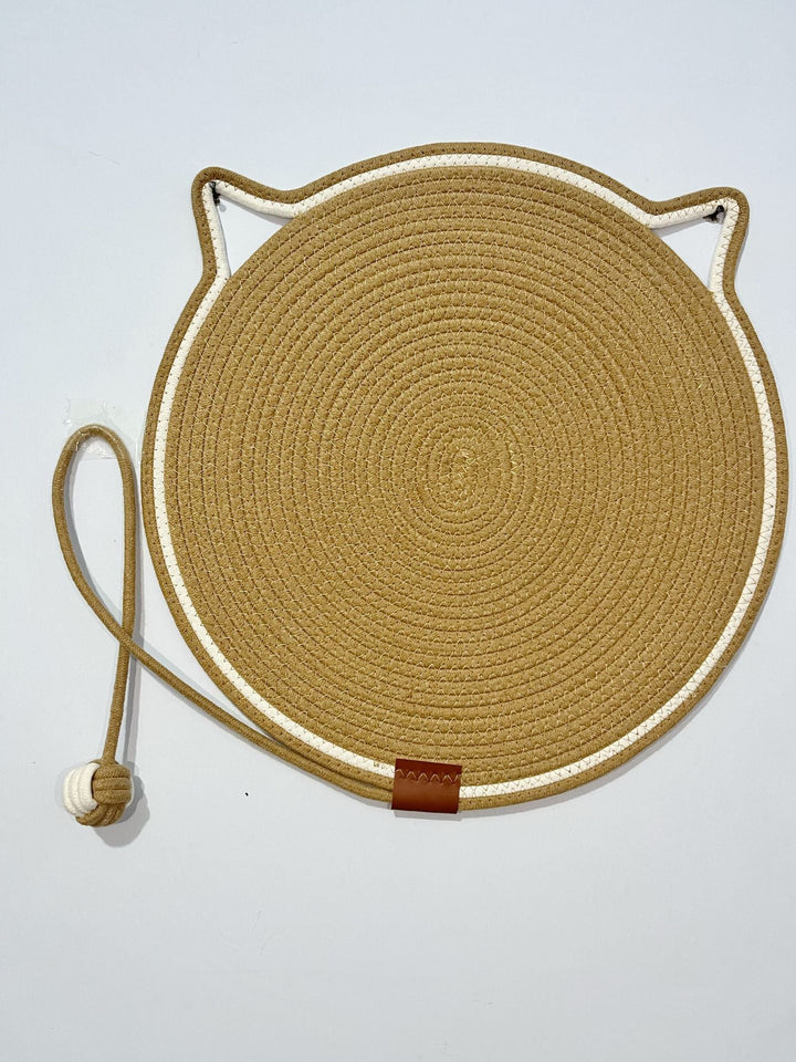 "Cat lounging on stylish, durable cat scratching rug; elegant, textured mat for optimal claw care and furniture protection."