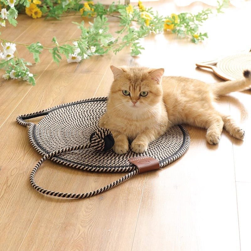 "Cat lounging on stylish, durable cat scratching rug; elegant, textured mat for optimal claw care and furniture protection."