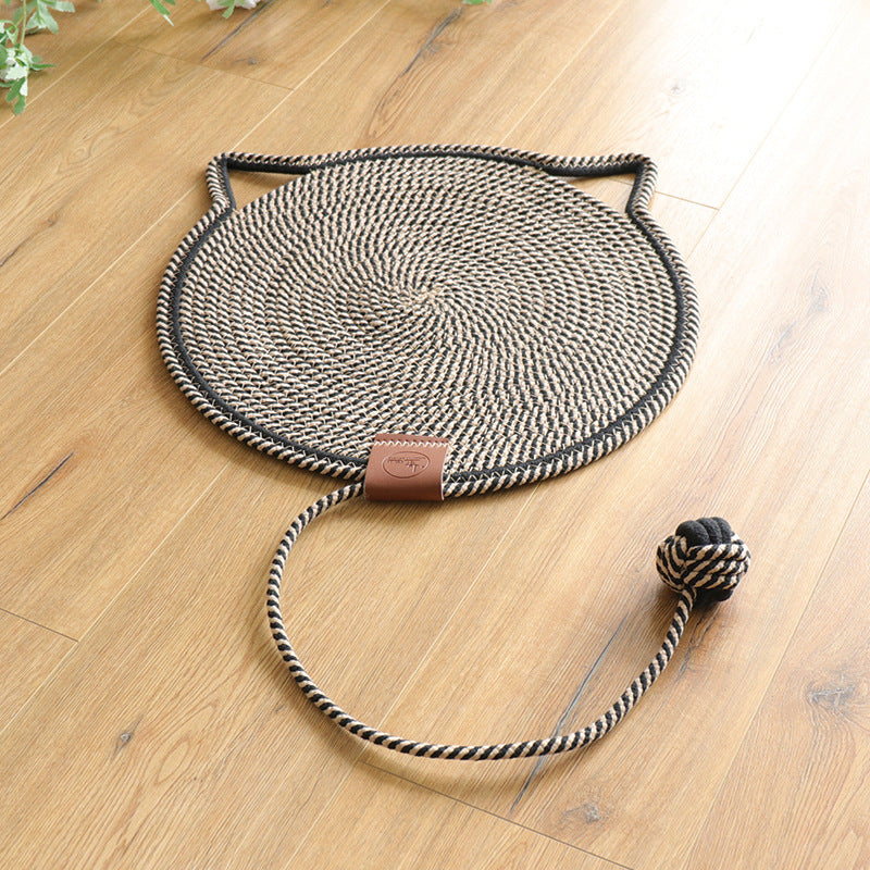 "Cat lounging on stylish, durable cat scratching rug; elegant, textured mat for optimal claw care and furniture protection."