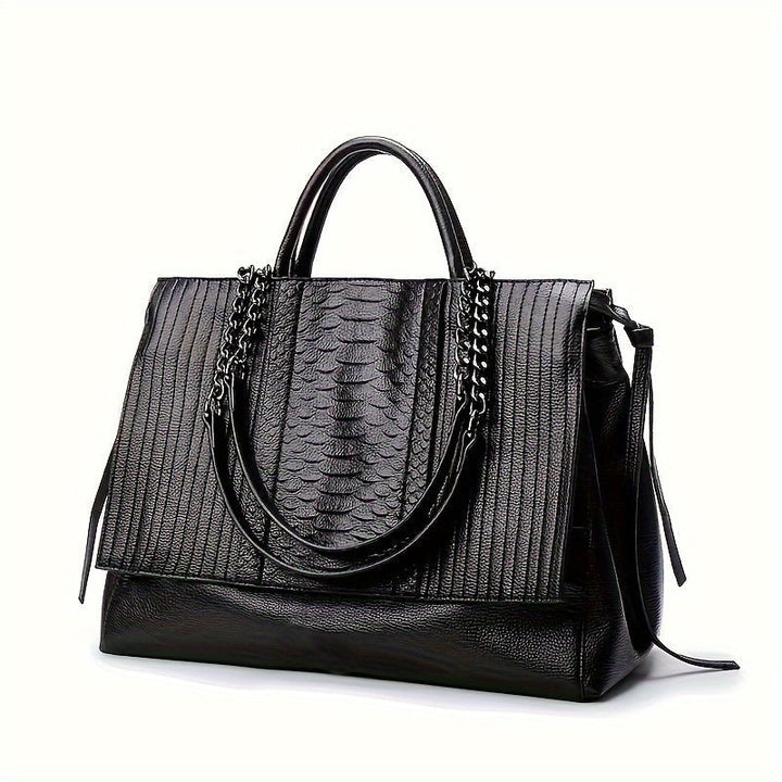 Chic black shoulder bag for women, sleek and spacious; ideal for office and casual use, complements all outfits.