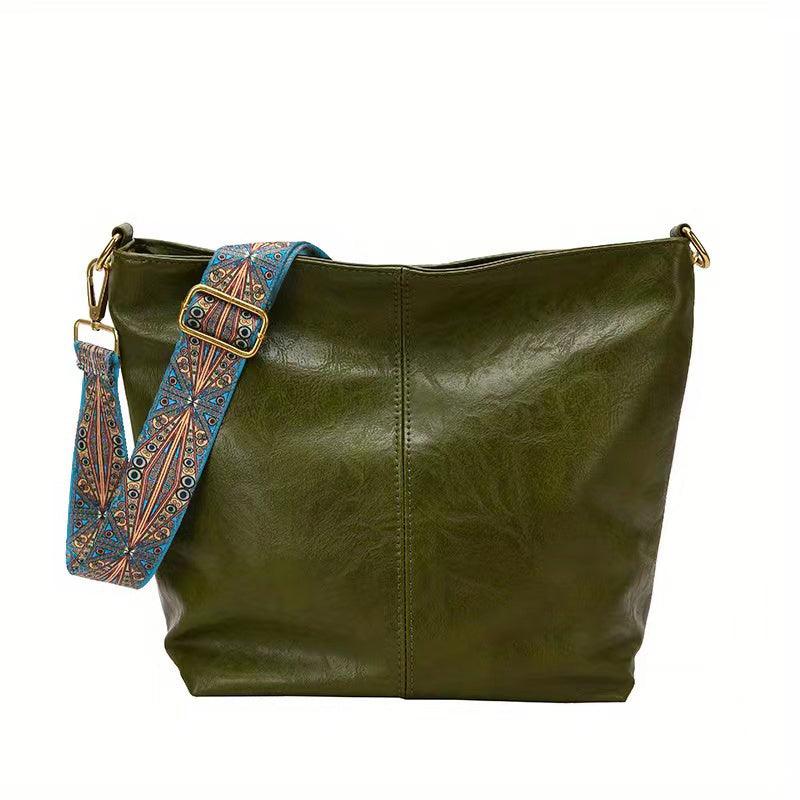 "Chic medium faux leather shoulder bag with embellished adjustable strap in black, caramel, green, or khaki for women."