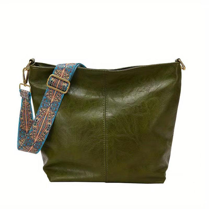 "Chic medium faux leather shoulder bag with embellished adjustable strap in black, caramel, green, or khaki for women."