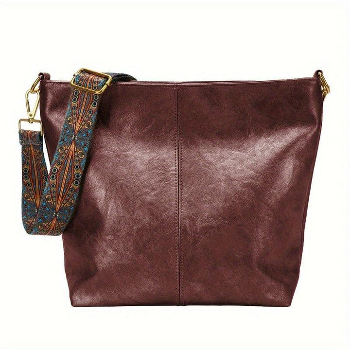 "Chic medium faux leather shoulder bag with embellished adjustable strap in black, caramel, green, or khaki for women."