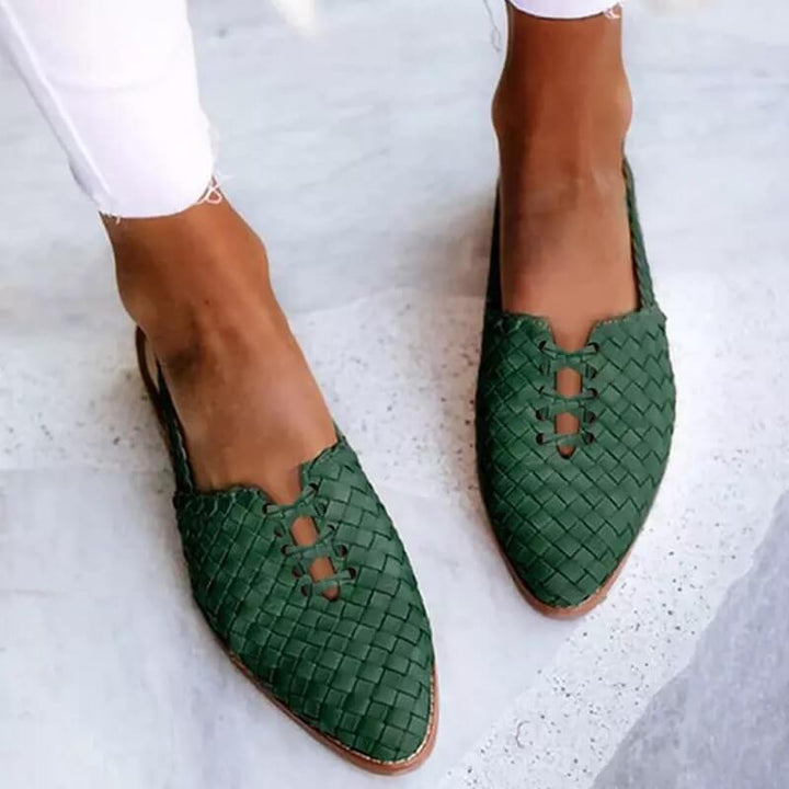 Chic women's closed-toe sandals with slip-on design, elegant detailing, side view, ideal for casual summer wear.