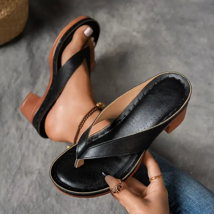 "Chic women's flip-flop sandals with platform heels, wide straps, open-toe design, in black, brown, gold, or white."