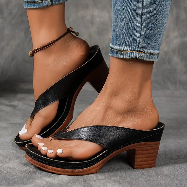 "Chic women's flip-flop sandals with platform heels, wide straps, open-toe design, in black, brown, gold, or white."
