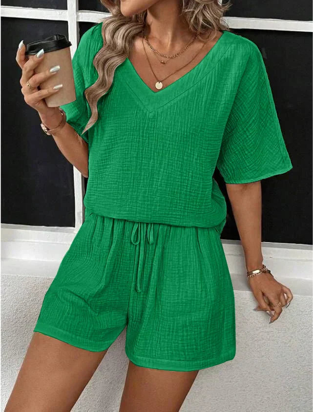 "Chic women's V-neck top and shorts set in beige, black, green, orange, pink, ideal for casual outings."
