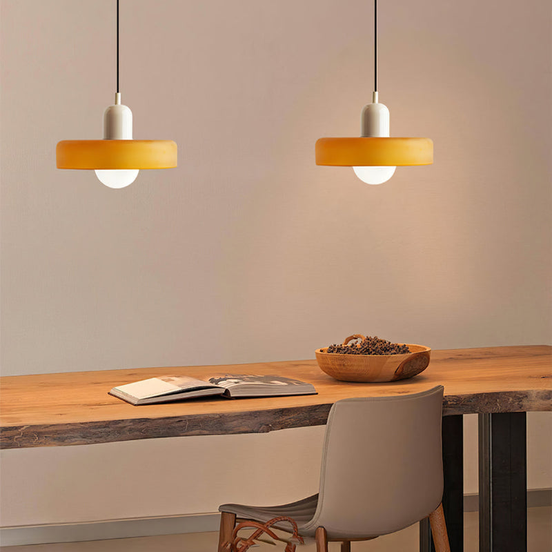 Colorful Bauhaus pendant light with vibrant stained glass design in white, orange, and green. Ideal ceiling lamps for home de
