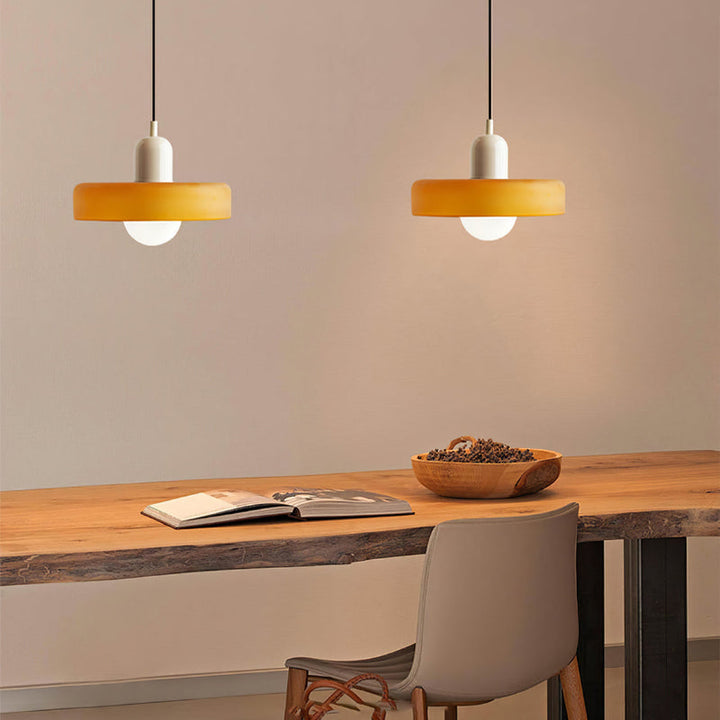 Colorful Bauhaus pendant light with vibrant stained glass design in white, orange, and green. Ideal ceiling lamps for home de