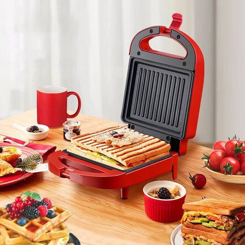 Compact 2-in-1 non-stick sandwich maker & toaster, sleek design, cooks 2 slices, even heating, perfect for small kitchens.