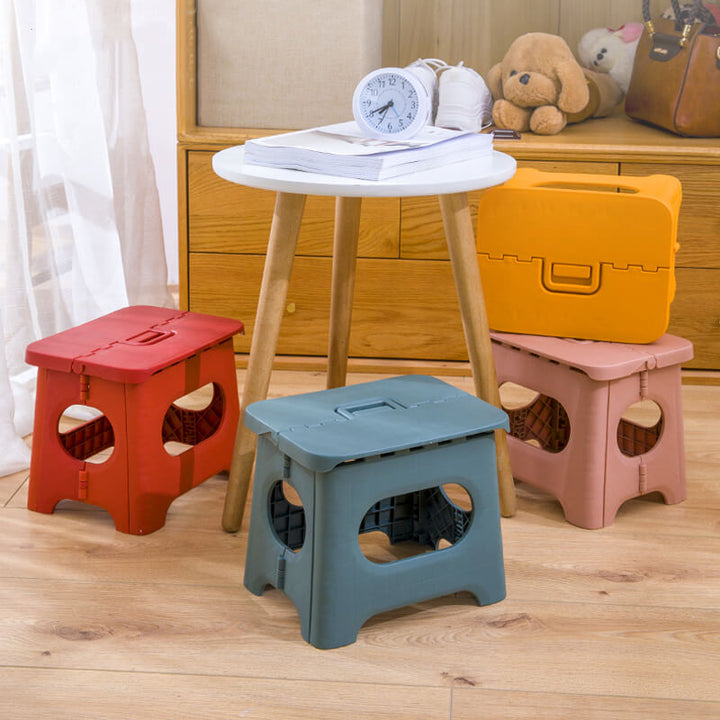 "Compact folding step stool with handle; durable plastic, various colors; perfect for kids and adults in any space."